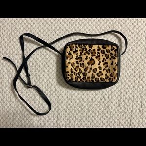 Sorpresa guinuine leather purse with hide